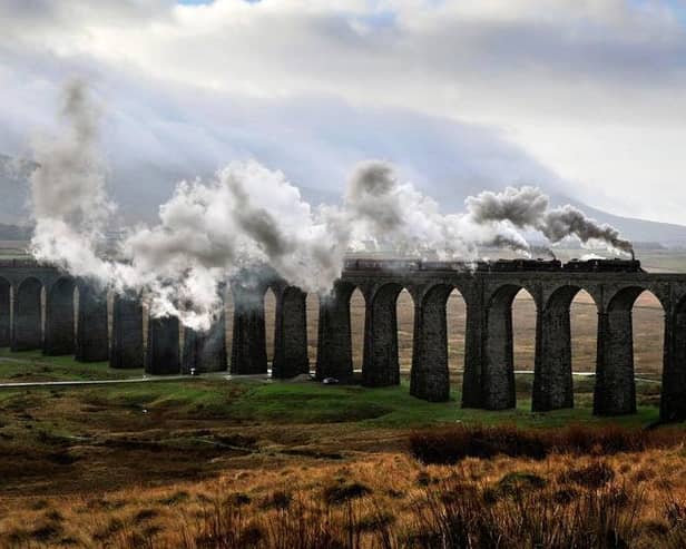 The Winter Cumbrian Mountain Express steams over the Ribblehead Viaduct on the Settle Carlisle line. Picture by Bruce Rollinson.