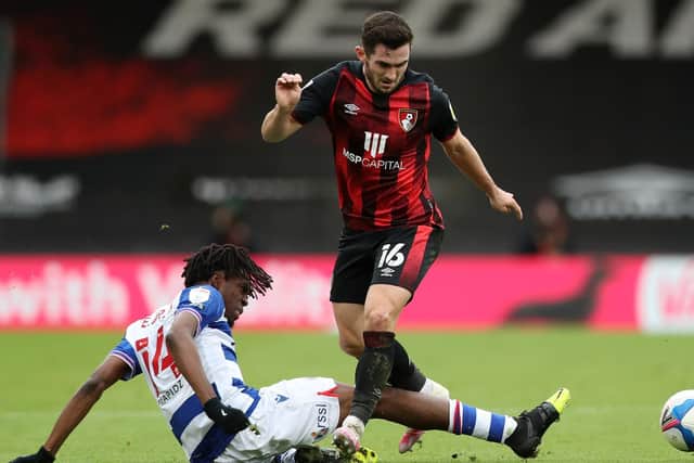 Bournemouth's Lewis Cook and Reading's Ovie Ejaria battle in the Championship. Pic: Getty