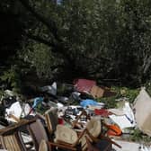 Residents have been warned that fly-tipping in water streams can cause flooding. Generic fly-tipping picture courtesy of Getty.
