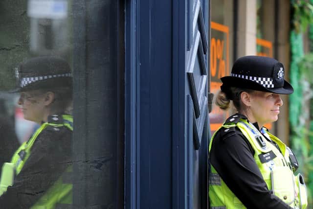Police officer pictured in Harrogate town centre following the re-opening of businesses following the first coronavirus lockdown in 2020