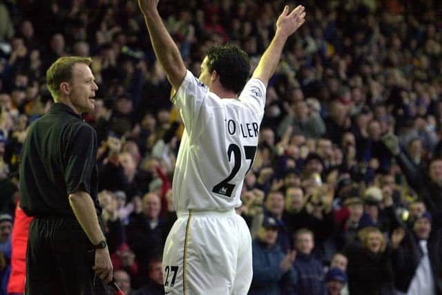 Robbie Fowler celebrates scoring against Arsenal at Elland Road in January 2002.