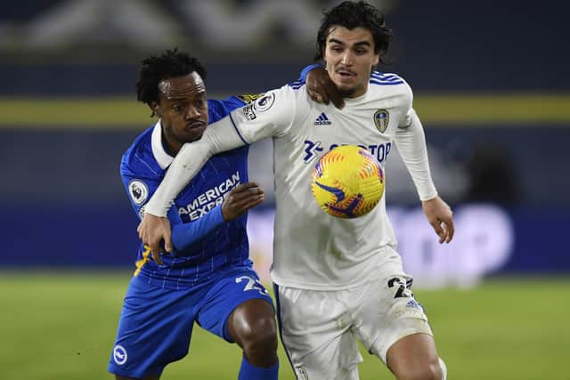 Leeds United's Pascal Struijk battle for the ball with Brighton's Percy Tau. Picture: Peter Powell/PA Wire.