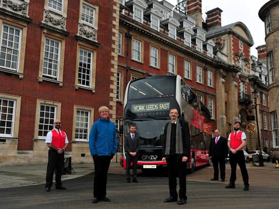 At York’s five-star Grand Hotel and Spa with one of Transdev’s £1.4m ‘Sky Class’ Cityzap buses are, from left: Cityzap Driver Barry Dean; Cllr. Paula Widdowson, City of York Council Executive Member for Environment and Climate Change; Paul Sammonds, Transdev Planning Manager; Cllr. Andy D’Agorne, City of York Council Deputy Leader and Executive Member for Transport; Paul Turner, Transdev Commercial Director; and Cityzap Driver Adam Williams