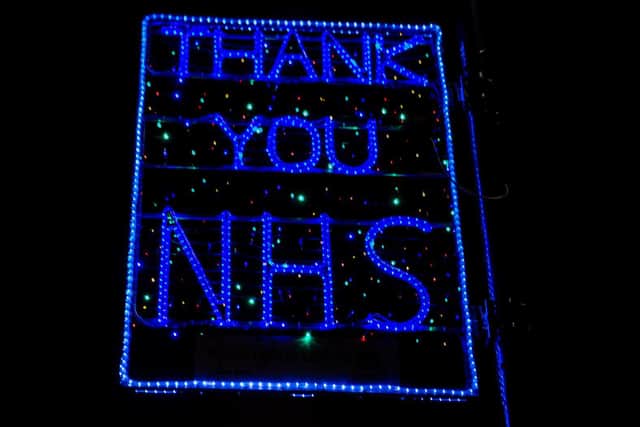 Buildings have been illuminated in blue, in tribute to selfless NHS staff. Photo credit: James Hardisty/JPIMediaResell