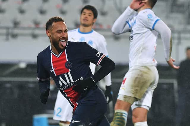 'GALACTICO': Paris Saint-Germain's Brazilian forward Neymar celebrates after scoring from the penalty spot during the Trophee des Champions match against Marseille. Photo by DENIS CHARLET/AFP via Getty Images.
