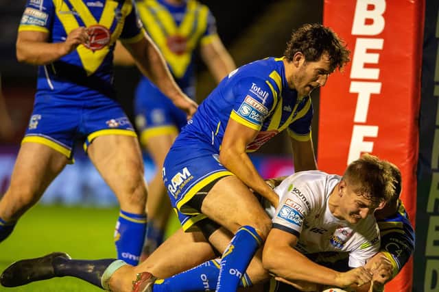 Sam Walters scores his first Super League try, against Warrington Wolves last October. Picture by Bruce Rollinson.