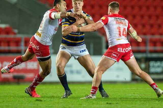Sam Walters takes on the St Helens defence. Picture by Bruce Rollinson.