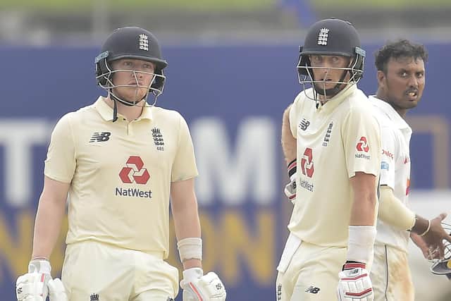 HELPING HAND: Joe Root with Dom Bess during the recent second Test match against Sri Lanka in Galle.Picture courtesy of Sri Lankan Cricket (via ECB).