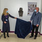 Leeds Hospitals Charity chief executive Esther Wakeman and Garry McBride, from Monumental Icons, unveiling a bust of Captain Sir Tom Moore unveiled in the Leeds Cancer Centre at St James's University Hospital in December last year. Picture: Tony Johnson