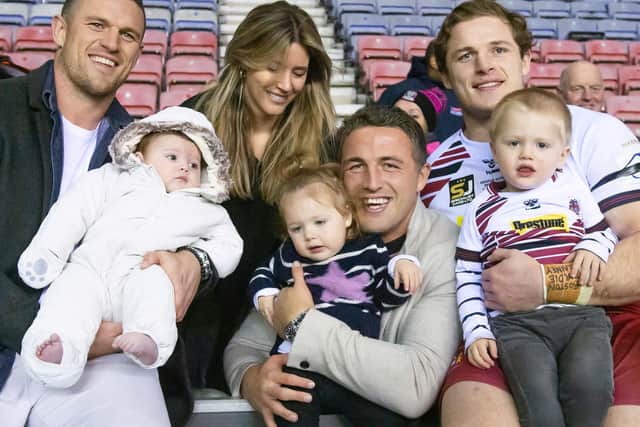 Happier times: George Burgess, far right, with brothers Luke and Sam and family after his Wigan Warriors debut v Warrington Wolves at the start of last season. (Allan McKenzie/SWpix.com)