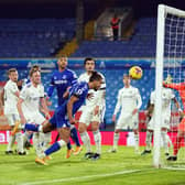 SET PIECE WOES: Leeds United's players can only look on as Dominic Calvert-Lewin heads home Gylfi Sigurdsson's corner. Photo by Jon Super - Pool/Getty Images.