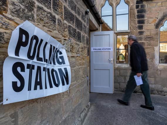 Voters arriving at Thorner Parish Centre, near Leeds for the 2019 local elections. Pidc: James Hardisty