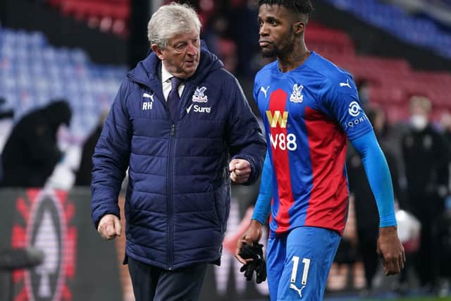 SPATE OF INJURIES: For Crystal Palace boss Roy Hodgson, left, pictured with Wilfried Zaha, right, who will miss Monday's clash at Leeds United with a hamstring injury. Photo by John Walton - Pool/Getty Images.