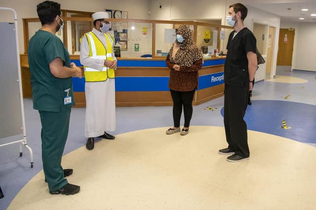 Qari Asim with medical staff at Craven Road Medical Practice in Woodhouse. Picture: Tony Johnson