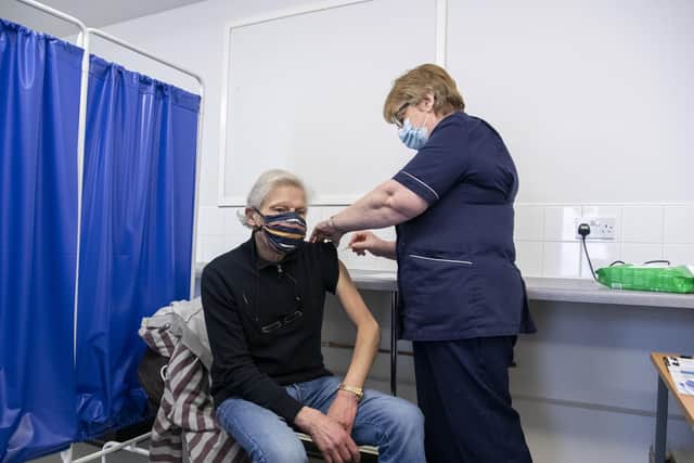 A patient receives the Oxford/AstraZeneca jab at Craven Road Medical Practice. Picture: Tony Johnson