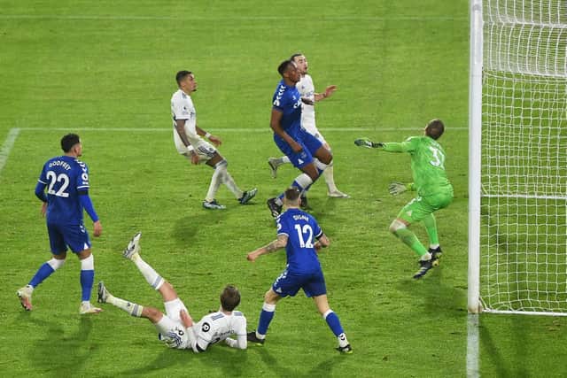 SO CLOSE: Leeds United striker Patrick Bamford's header drops on to the crossbar in Wednesday night's 2-1 defeat against Everton at Elland Road. Photo by MICHAEL REGAN/POOL/AFP via Getty Images.