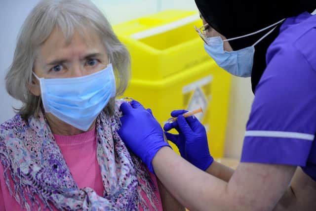 Maureen Mitson, aged 72, gets the Astra Zenica vaccination at Elland Road.