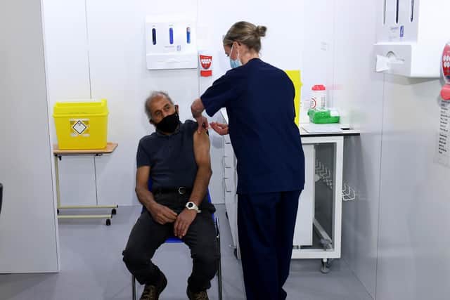 Mewa Singh Khela is the first person to be Vaccinated by Olivia Smart, Leeds United women's player.
