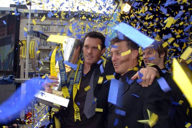 Dave Furner, centre, retired as a player after Leeds' 2004 title win. Picture by Steve Riding.