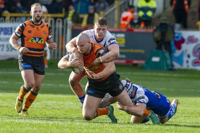 Cheyse Blair is tackled during Tigers' win over St Helens last March. Picture by Tony Johnson.