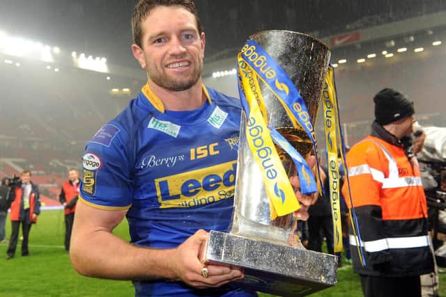 Danny Buderus with the Super League trophy at Old Trafford in 2011. Picture by Steve Riding.