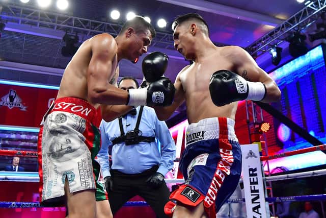 THREAT: Mauricio Lara, right, in action against Alejandro Palmero in Mexico City in July last year. Picture: Jaime Lopez/Jam Media for Zanfer/Getty Images.