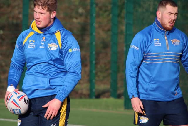 Tom Holroyd, left, at training this week, with teammate Cameron Smith. Picture by Phil Daly/Leeds Rhinos.
