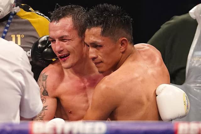 Best of enemies: 
Josh Warrington congratulates Mauricio Lara. 
Pictures: Dave Thompson/Matchroom Boxing