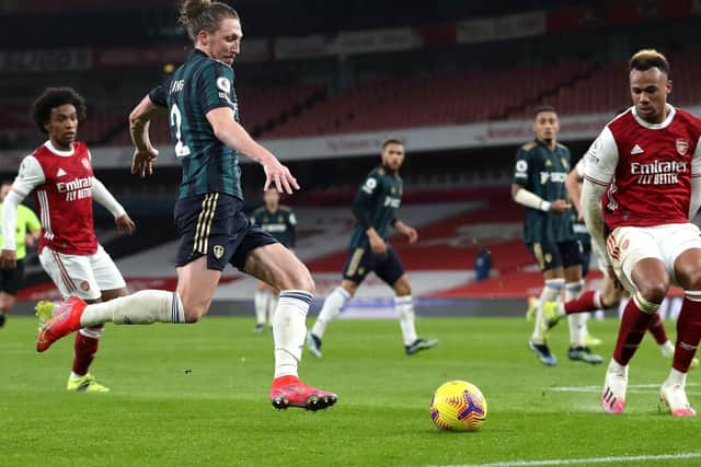 FIGHTBACK: Leeds United's Luke Ayling fires in a cross during the second half of Sunday's 4-2 defeat at Arsenal. Photo by Catherine Ivill/PA Wire.