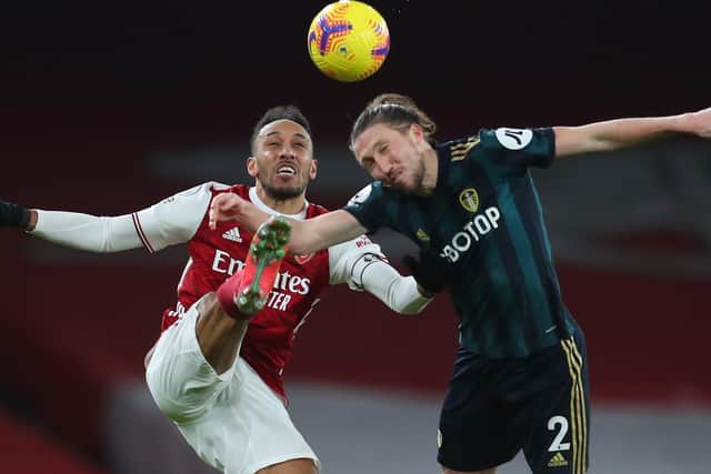 TOUGH TEST: Leeds United defender Luke Ayling, right, battles with Arsenal's hat-trick hero Pierre-Emerick Aubameyang in Sunday's 4-2 defeat at the Emirates.
Photo by CATHERINE IVILL/POOL/AFP via Getty Images.