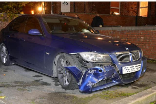 Asif Khan's damaged BMW after he survived drive-by shooting unscathed.