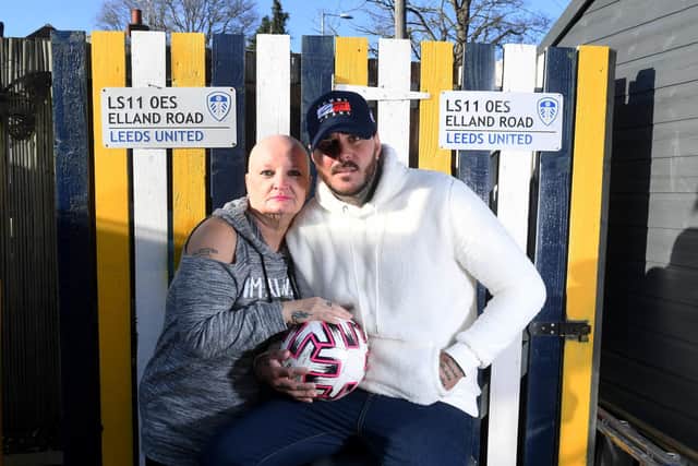 Darren Powell with his mum Gaynor pictured outside the Leeds United themed bar he has built outside his home in Wakefield.

Picture: Simon Hulme