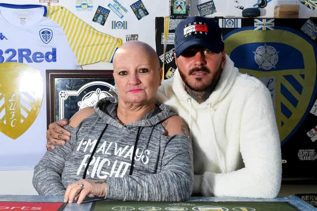 Darren Powell with his mum Gaynor pictured in the Leeds United themed bar he has built outside his home in Wakefield.

Picture: Simon Hulme