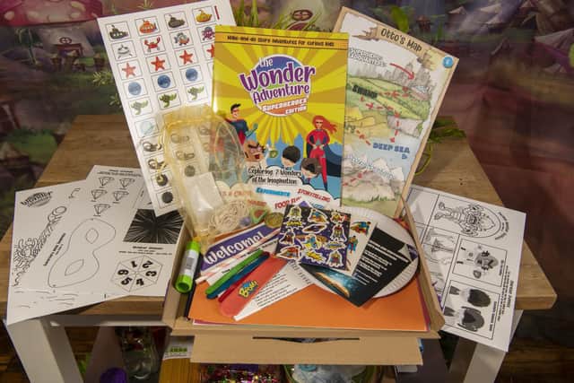 Subscribers will receive an adventure book pack this like each month including an activity book, craft materials and an audio book. Picture: Tony Johnson