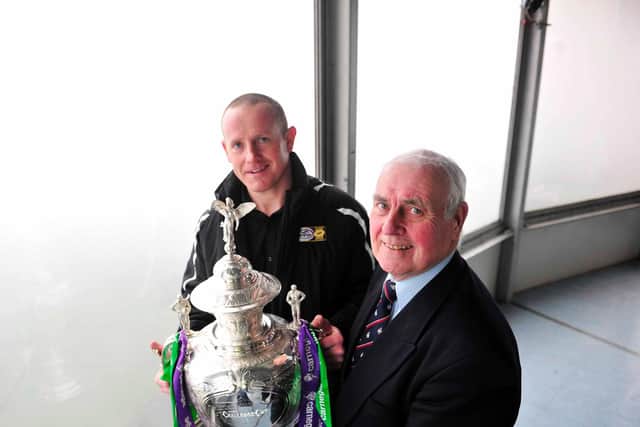 Biully Thompson, right, pictured in 2011 with then-Super League referee Richard Silverwood. Picture by Simon Wilkinson/SWpix.com.