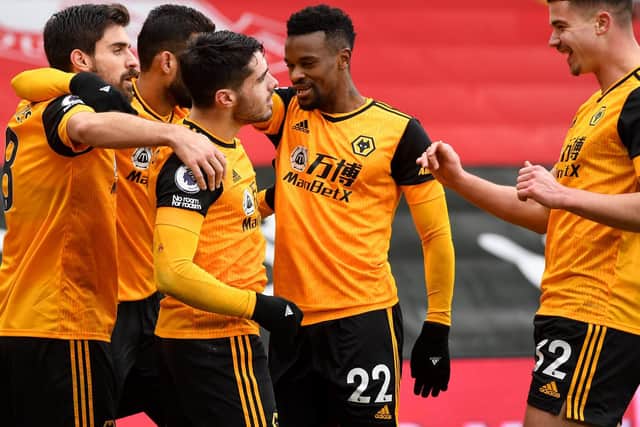 COMEBACK COMPLETE: Winger Pedro Neto, centre, celebrates with his team mates after scoring the winning goal in Sunday's clash at Southampton in which his side were 1-0 down. Photo by Andy Rain - Pool/Getty Images.