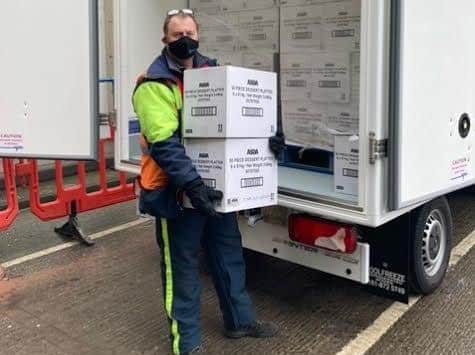 A key worker delivers frozen Asda food to TBBT