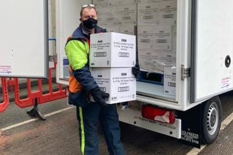 A key worker delivers frozen Asda food to TBBT