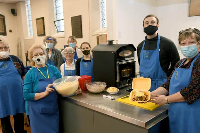 Holbeck together chef Julie Marshall, right, with other volunteers. Picture: Gary Longbottom