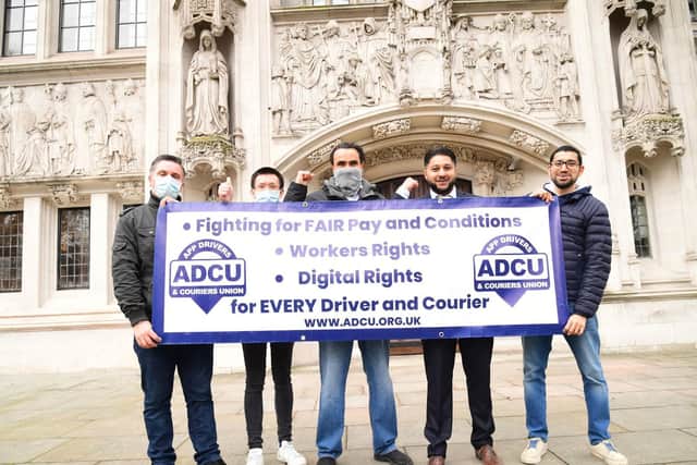 Uber drivers with Yaseen Aslam (second right) outside the Supreme Court, London, after Supreme Court justices ruled against Uber operating companies and concluded that drivers should be classed as workers, not independent third-party contractors. Credit: Ian West/PA Wire