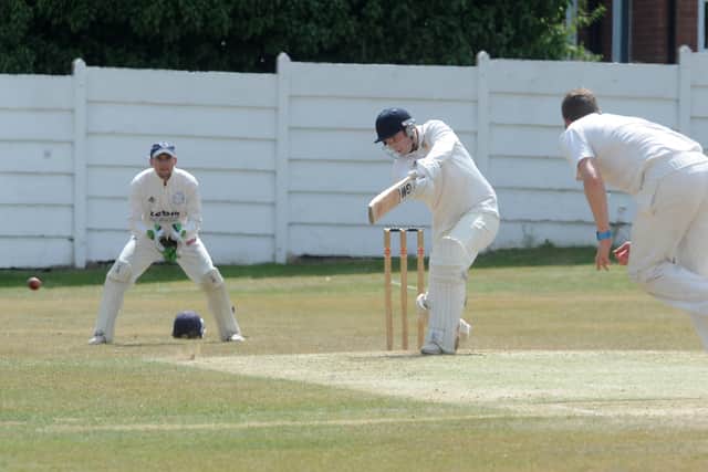 BRING IT BACK: Townville batter Harry Clewett drives through the covers in a BRadford League clash with Farsley. Picture: Steve Riding.