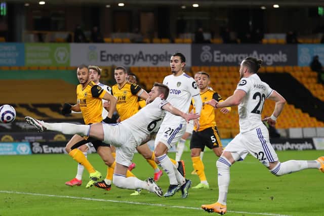 DENIED: Leeds United skipper Liam Cooper was denied three times from Raphinha set pieces by Wolves keeper Rui Patricio. Photo by Catherine Ivill/Getty Images.
