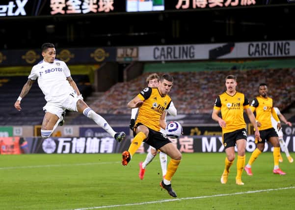 NEAR MISS: Leeds United's Raphinha (left) has a shot on goal against Wolves. Picture: Alex Pantling/PA Wire.