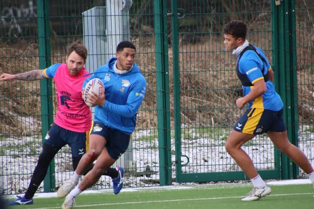 Levi Edwards, centre, in pre-season training alongside Richie Myler, left and Corey Hall. Picture by Phil Daly/Leeds Rhinos.