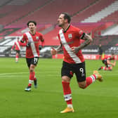 KEY THREATS: Southampton's top scorer Danny Ings, centre, and also in form Takumi Minamino, left. Photo by Andy Rain - Pool/Getty Images.