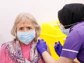 Maureen Mitson, aged 72, received an injection of the the Oxford/AstraZeneca coronavirus vaccine from NHS nurse Maha Mutardi at the Elland Road vaccination centre in Leeds (photo: PA Wire/ Danny Lawson)