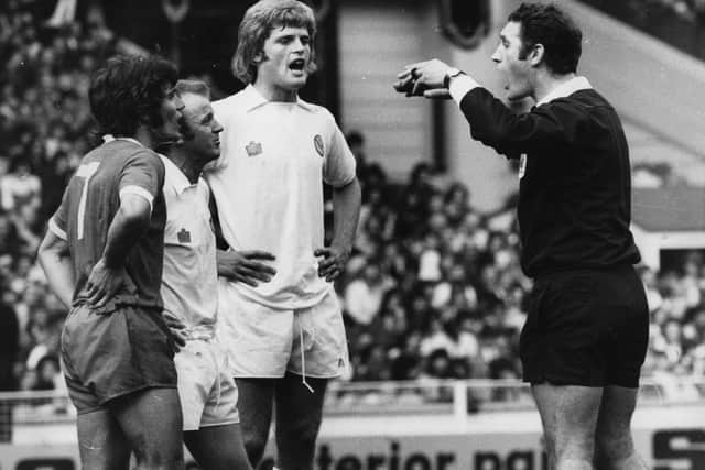 Former Leeds United defender Gordon McQueen, centre. Photo by Evening Standard/Getty Images.