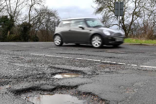 Funding to repair roads in west Yorkshire cut by more than a quarter