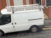 A white Ford Transit van with bags of asbestos inside has been stolen.
