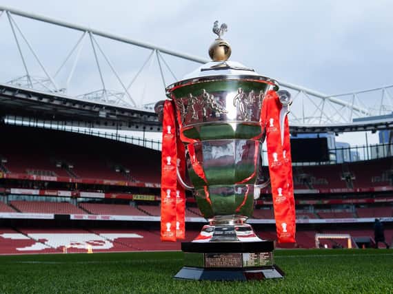 The Rugby League World Cup trophy at Arsenal's Emirates Stadium which will host a men's semi-final.